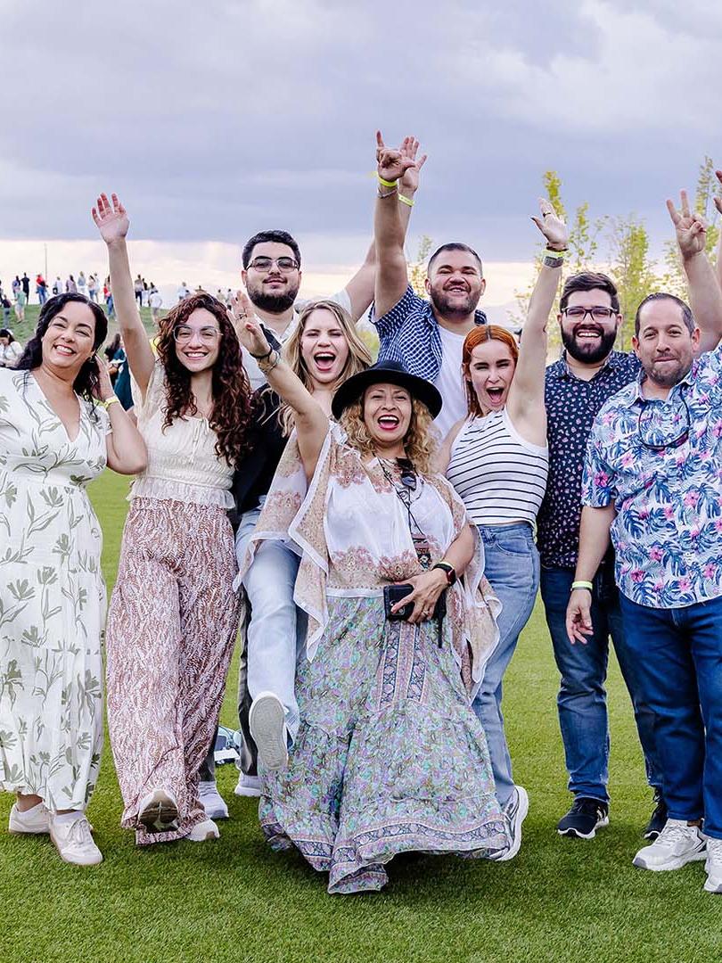 family and friends take a group on a nice summer day outdoors
