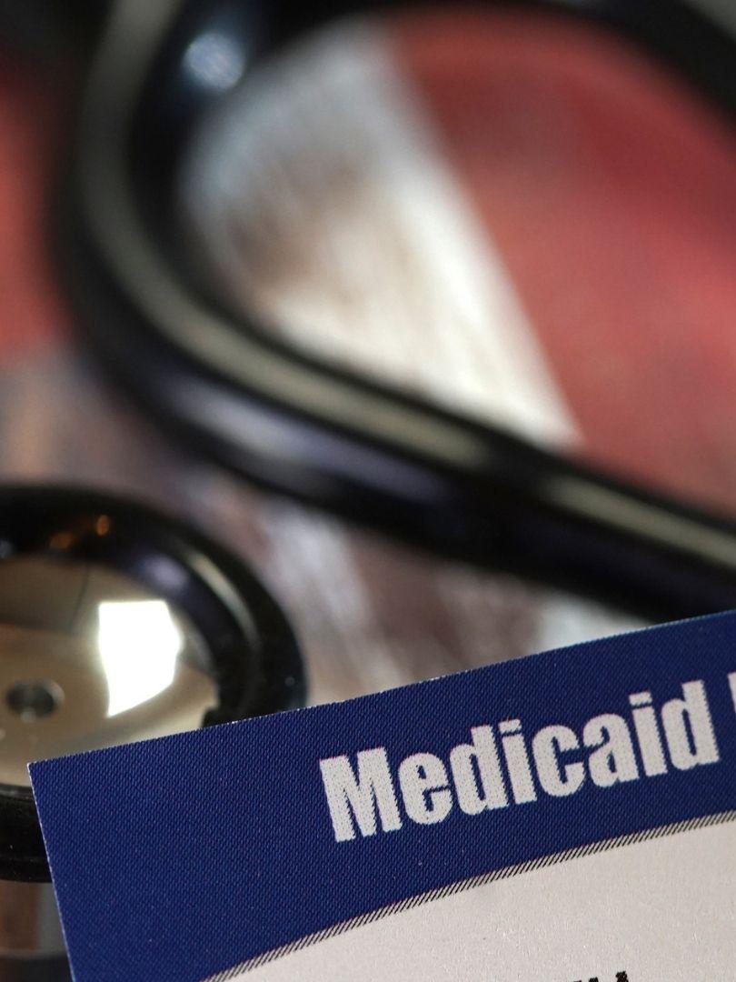 A stethoscope and image that says medicaid insurance