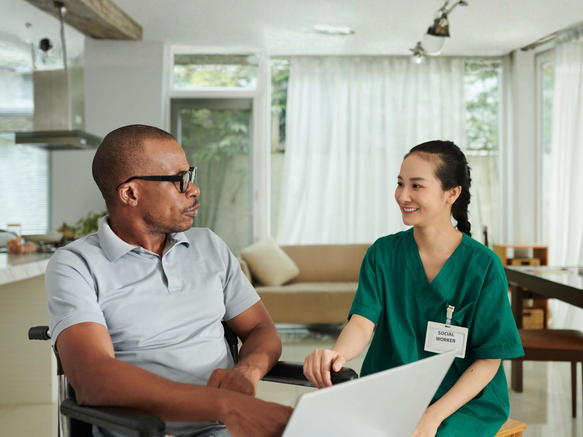 A provider speaking to a patient