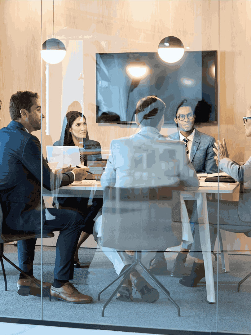 Group of people at a conference table