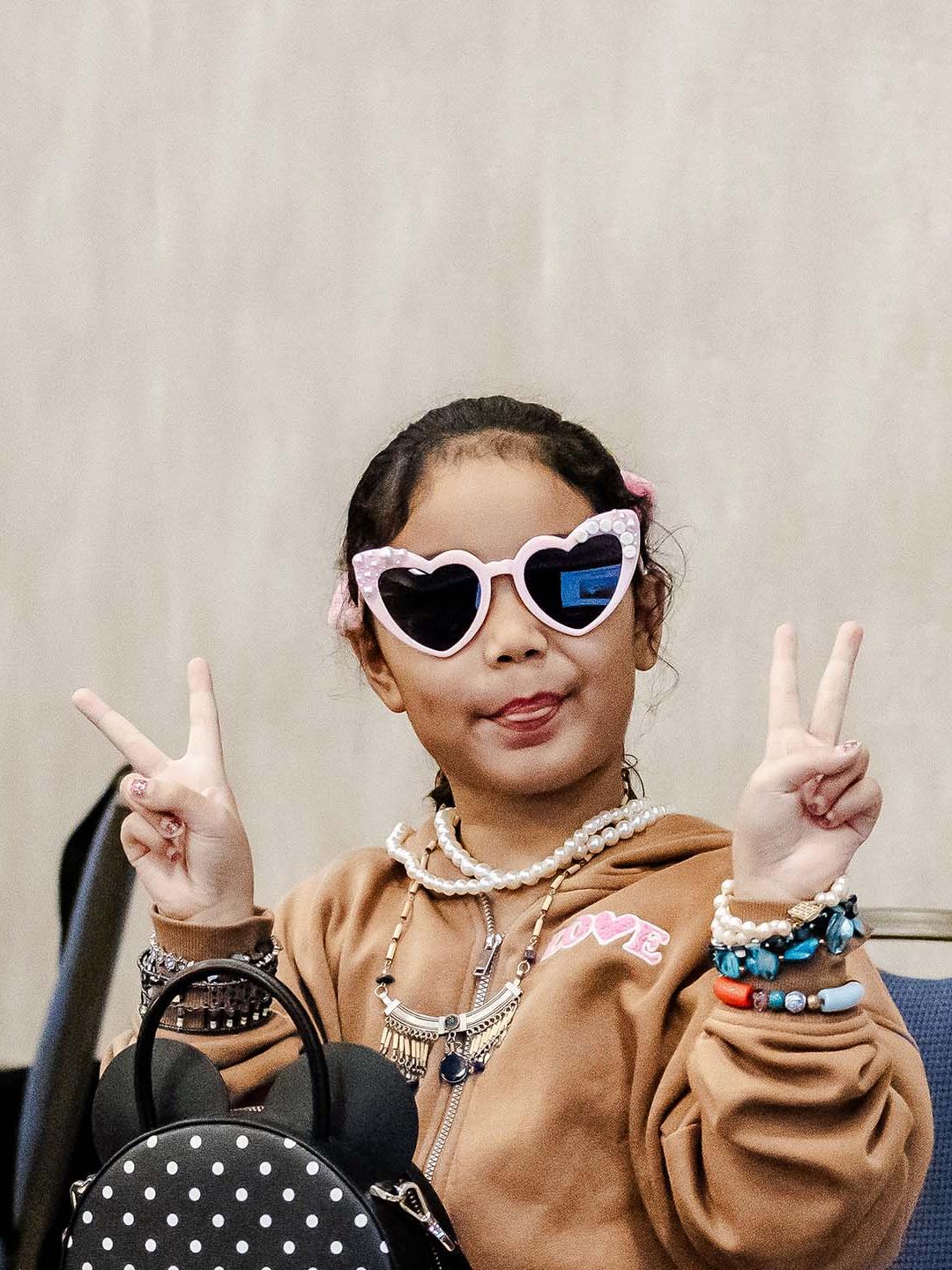 BDC 2025 - A girl wearing sunglasses