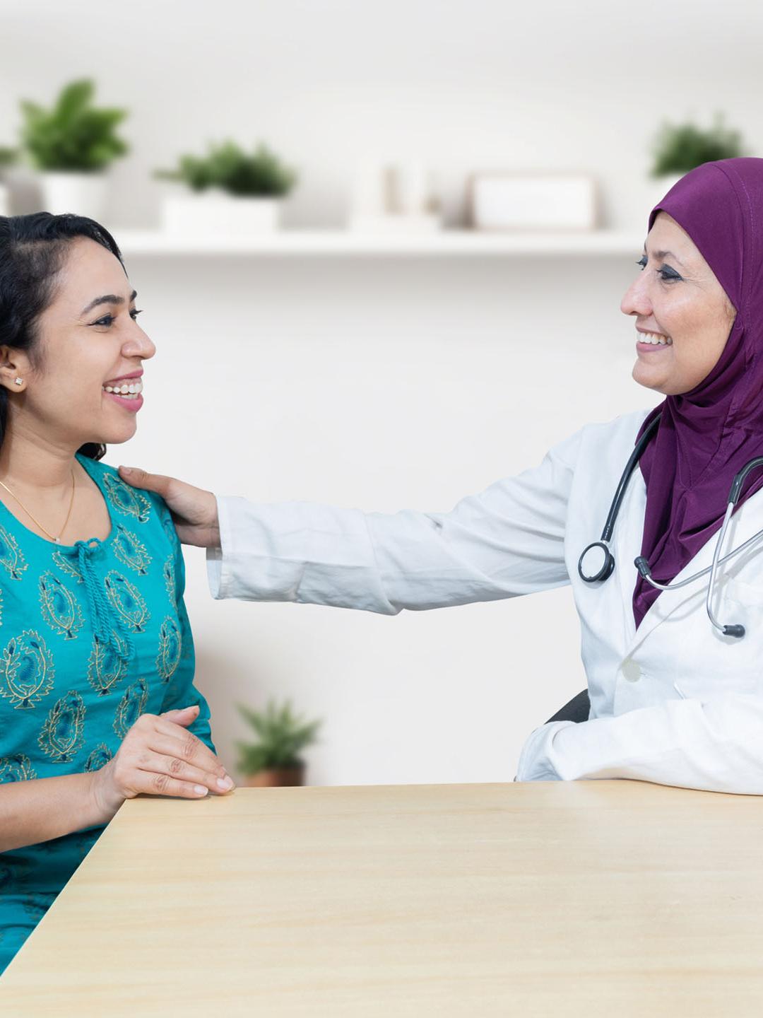 A doctor across from her patient