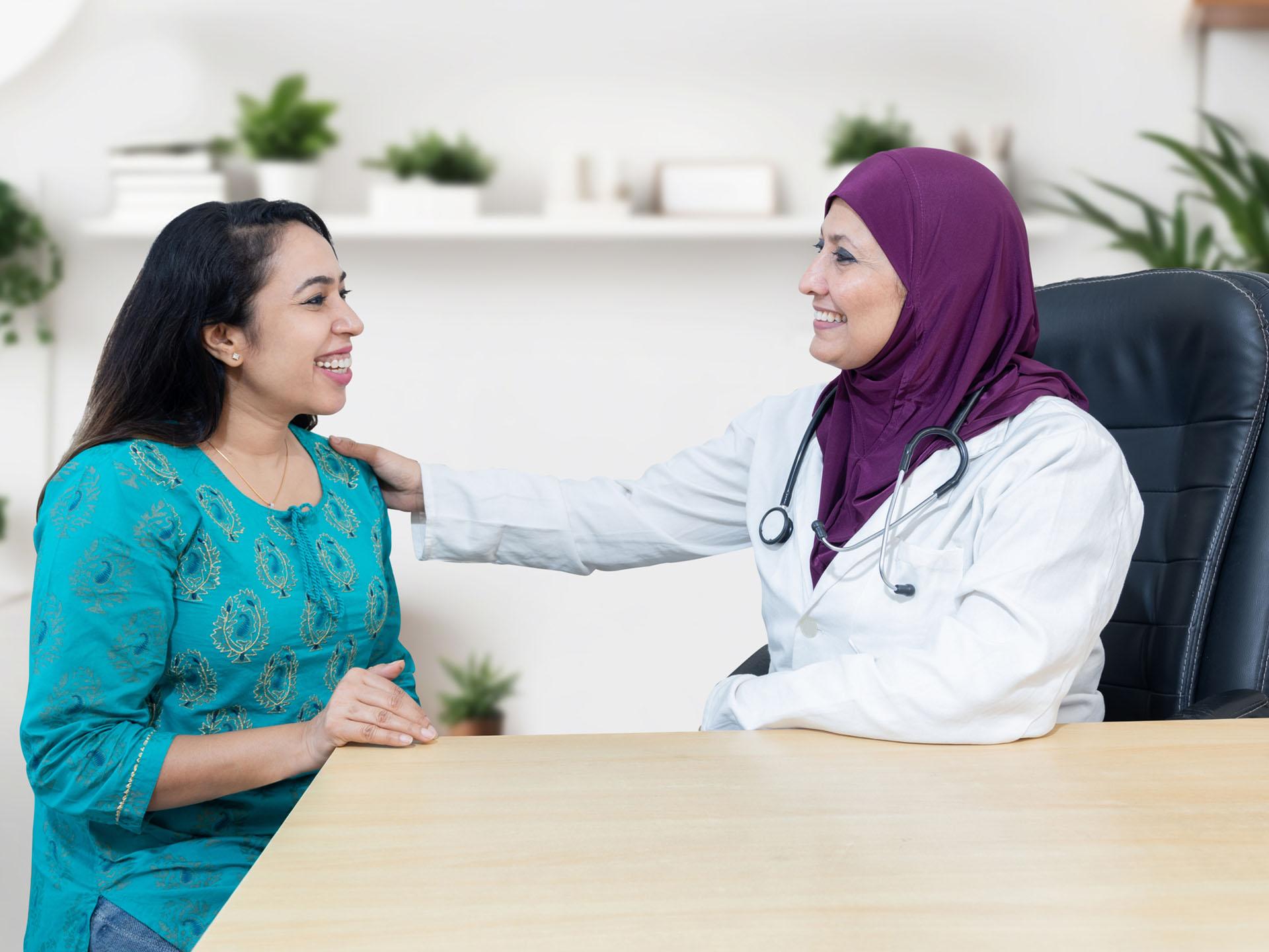 A doctor across from her patient