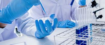 Researchers in a lab with equipment