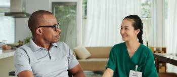 A provider speaking to a patient