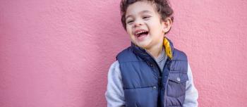 Young boy with smiles (Latino or bi-racial)
