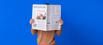 Person reading the paper