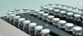 Ampoule bottles on an assembly line