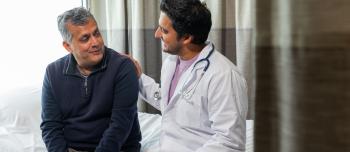 Doctor speaking with a man Doctor speaking with a man