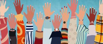 A group of diverse hands raised up