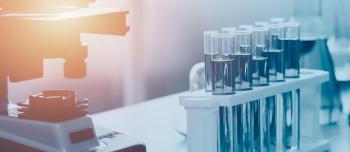 A microscope and research beekers