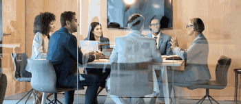 Group of people at a conference table