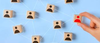 Wooden blocks with people icon on blue background