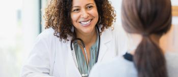 Doctor speaking with a patient