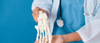 Doctor with bones hands