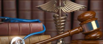 gavel stethoscope and caduceus sign on books background medicine picture