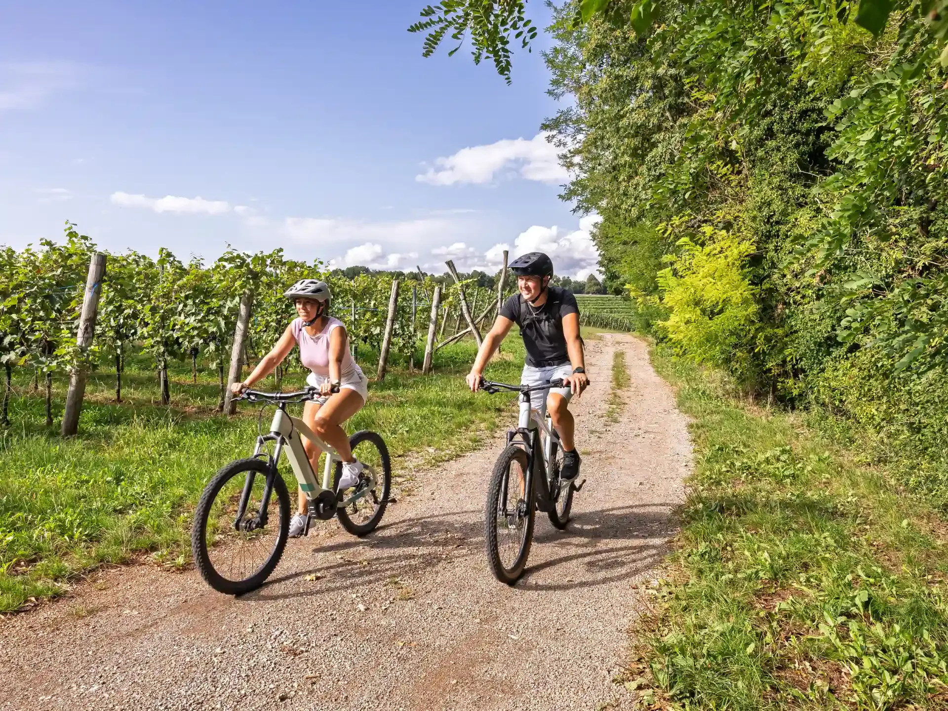 Two people riding a bike