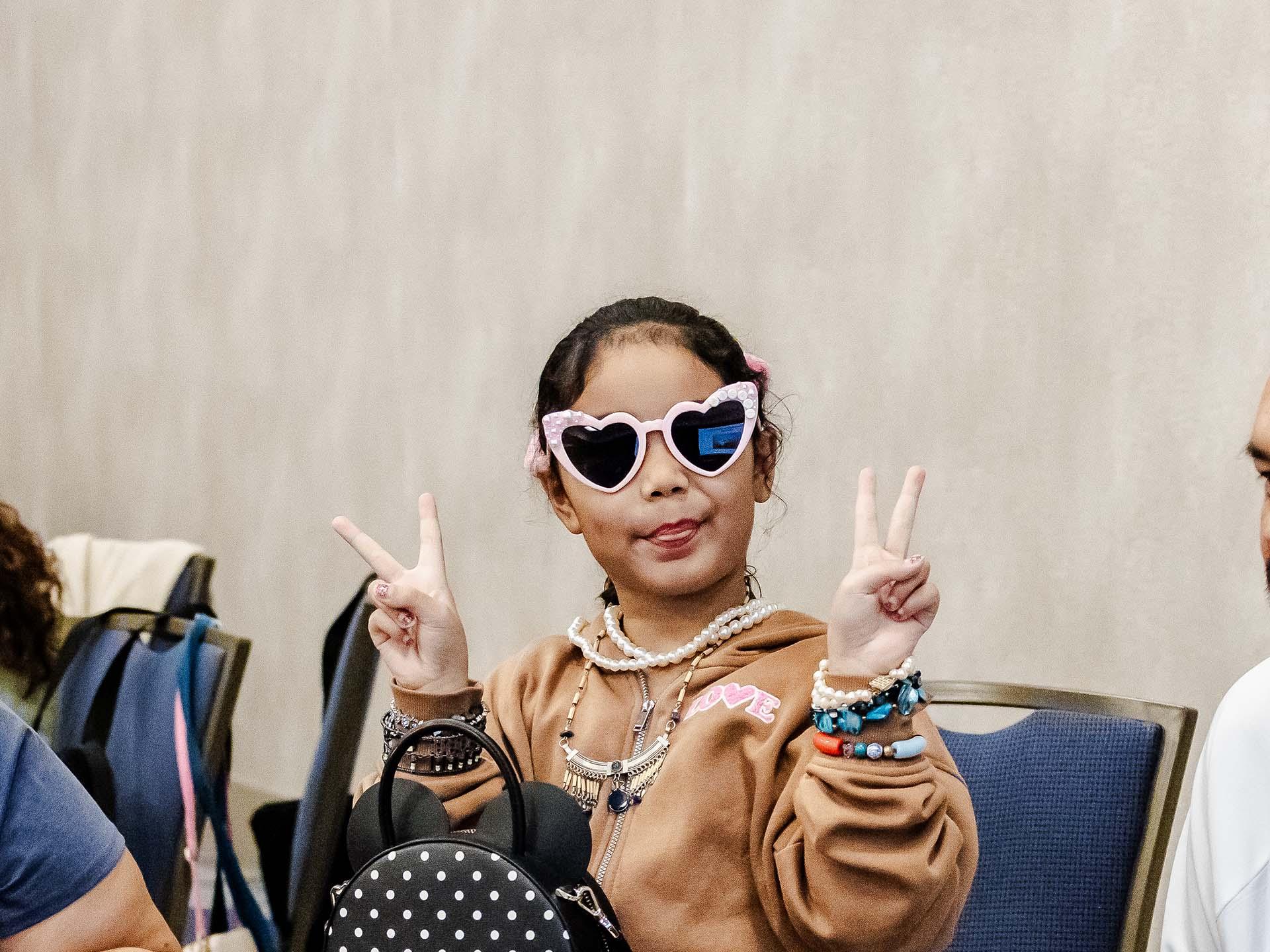BDC 2025 - A girl wearing sunglasses