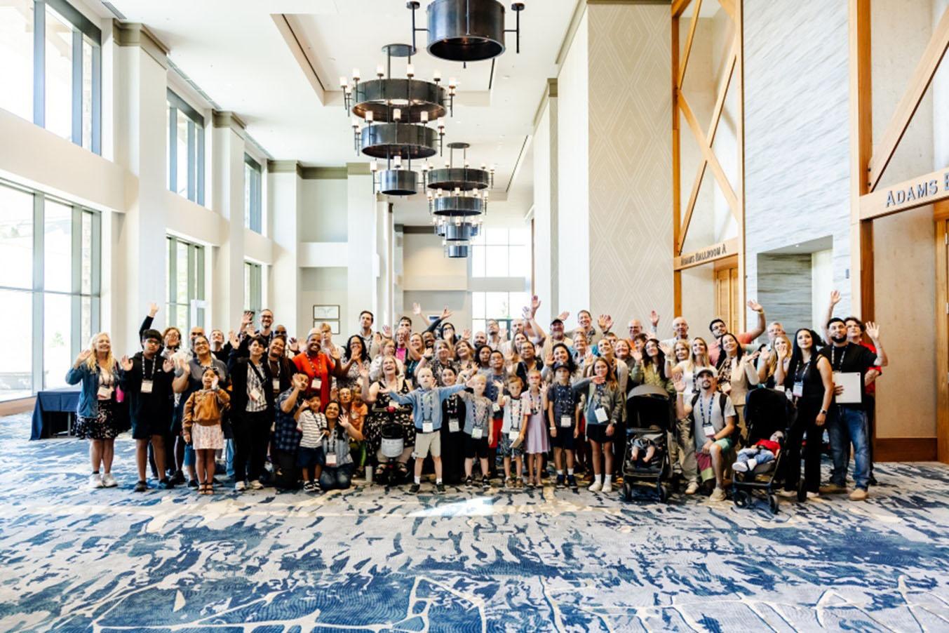 A group posing for a photo at BDC 2025